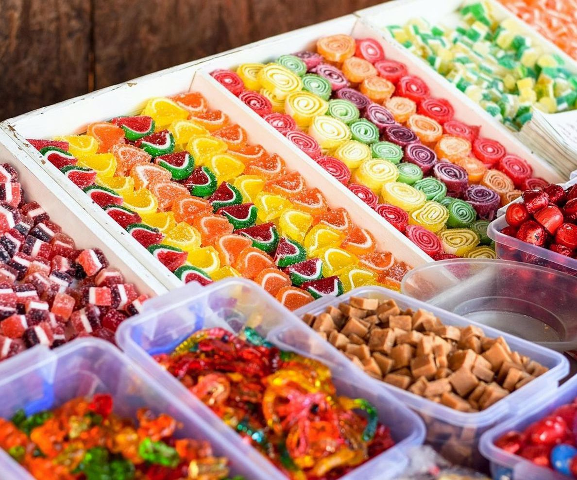 Master confectioners carefully crafting each piece of chocolate